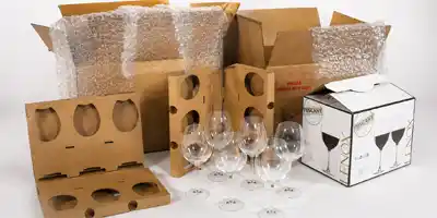 Paper inserts for glassware packaging